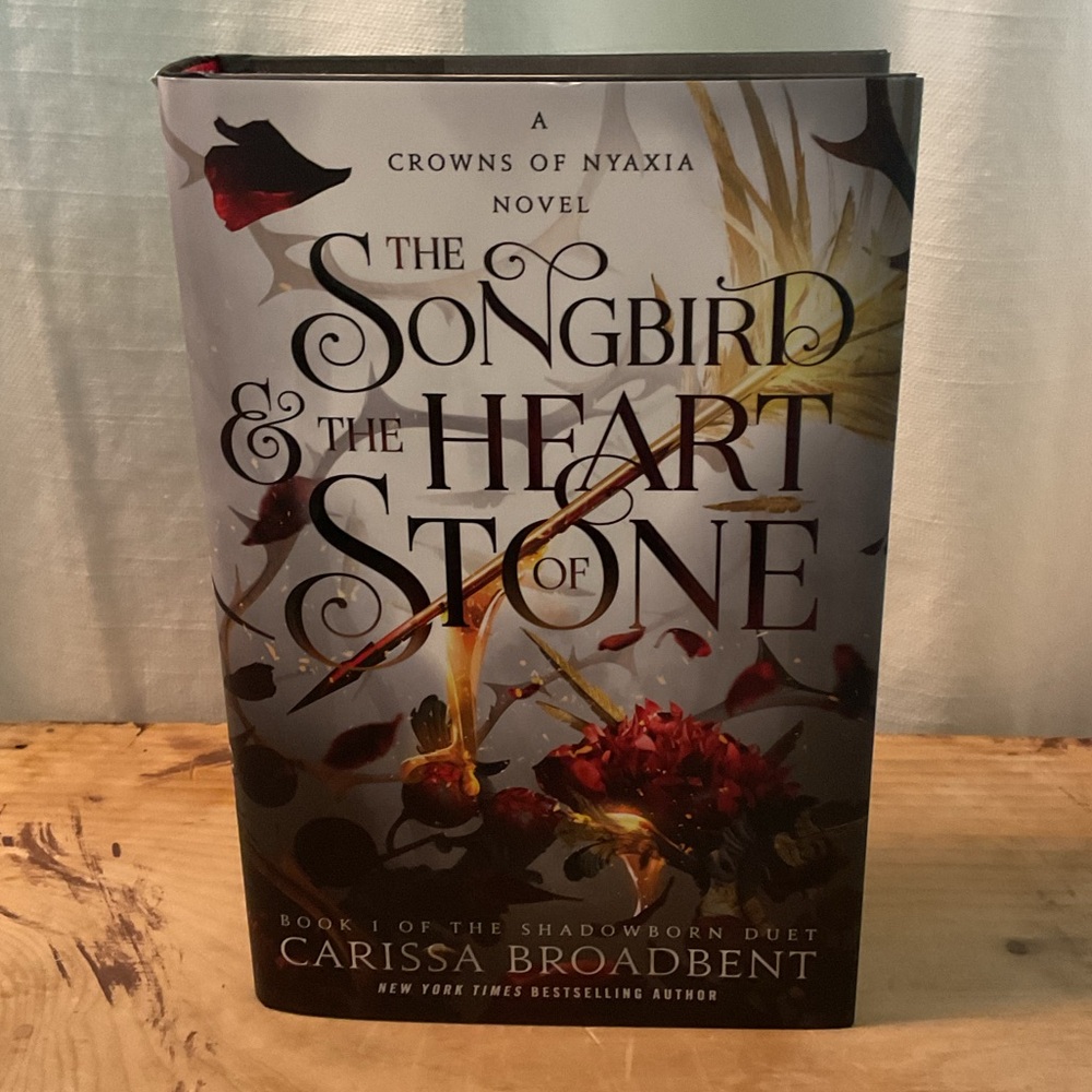 The Songbird & The Heart of Stone Book